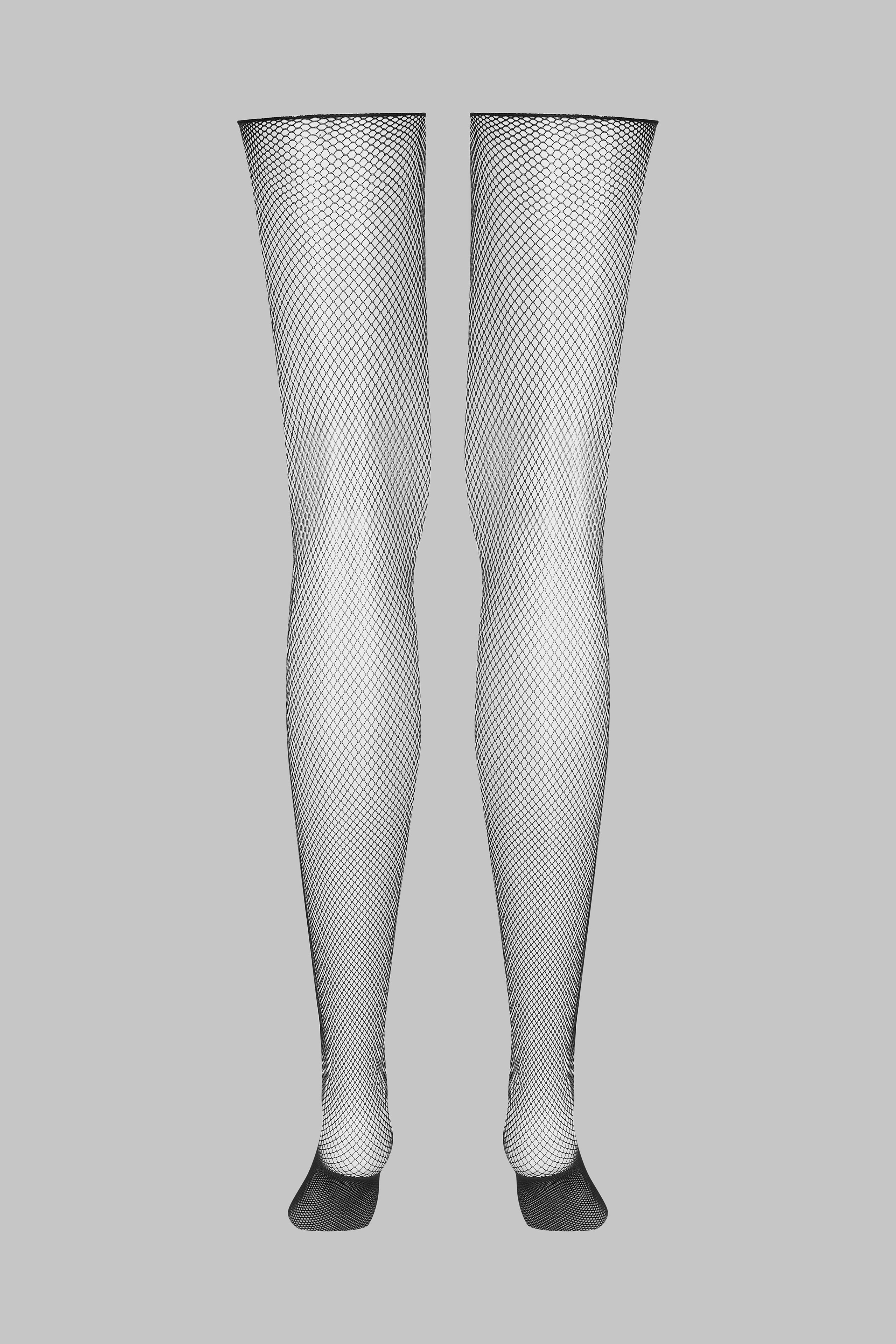 Fishnet cut and curled stockings – Maison Close